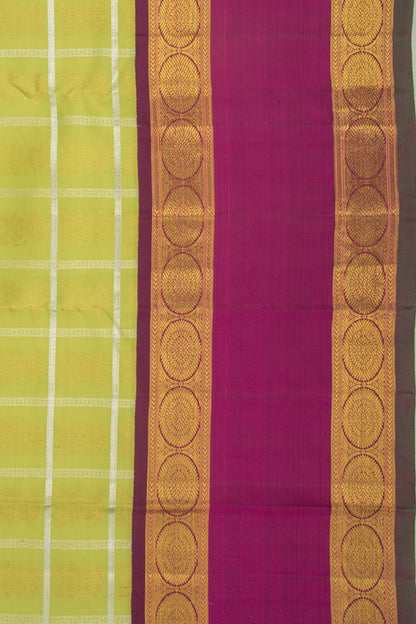 Kanchipuram Silk Checks And Butta Green Saree