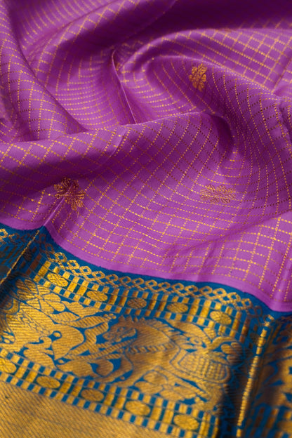 Kanchipuram Silk Checks And Butta Lavender Saree