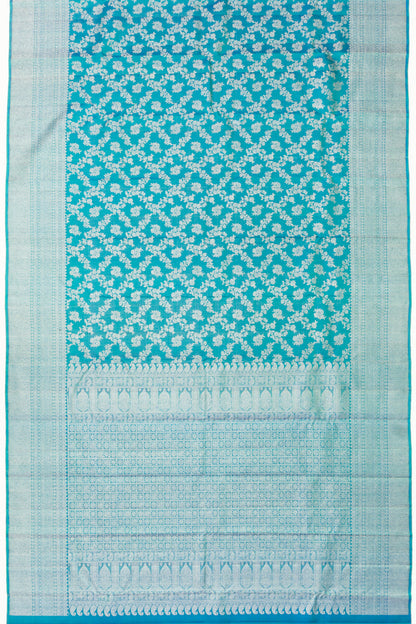 Kanchipuram Silk Antique Zari Jaal And Butta Teal Blue Saree